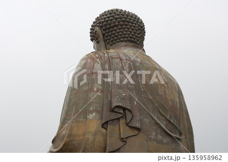 Lantau Island, Hong Kong - Jan 28 2026: The big Buddha at Po Lin Monastery in Lantau island Lantau Island, Hong Kong - Jan 28 2026: The big Buddha at Po Lin Monastery in Lantau island 135958962