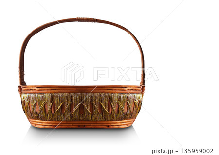 front view oval Wicker Basket Decorated with gold and white thread in the middle on white background, object, decor, fashion, copy space 135959002