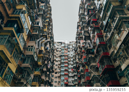 A giant multi-story residential building, Monster House features a unique combination of vibrant colors 135959255