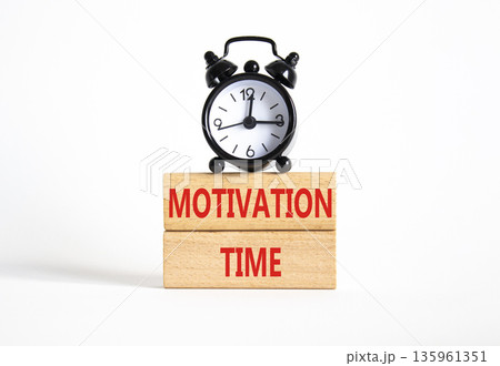 Motivation Time symbol. Concept word Motivation Time on wooden blocks. Beautiful white background with alarm clock. Business and Motivation Time concept. Copy space Motivation Time symbol. Concept word Motivation Time on wooden blocks. Beautiful white background with alarm clock. Business and Motivation Time concept. Copy space 135961351