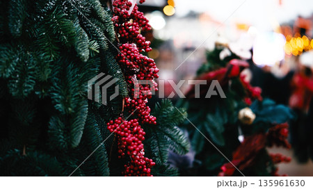 Christmas Tree Decorated With Red Berries At Holiday Market Christmas Tree Decorated With Red Berries At Holiday Market 135961630