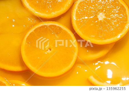 Bright juicy fruity background, oranges drenched in juice 135962255