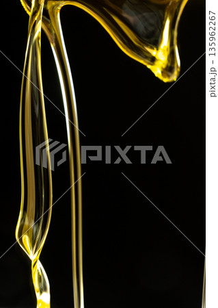 Abstract oil splashes and drips isolated on black for luxury design 135962267