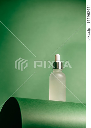 A frosted dropper bottle of facial serum A frosted dropper bottle of facial serum 135962454