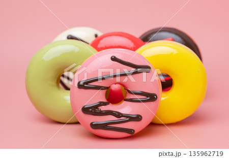 Close-up of glazed donuts Close-up of glazed donuts 135962719