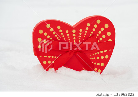 red hearts on the snow= 135962822