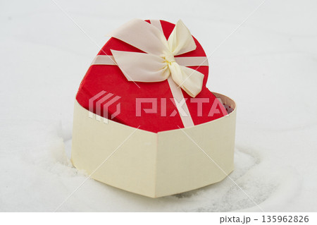 red hearts on the snow 135962826