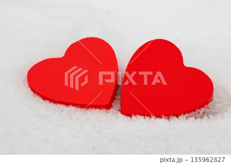 red hearts on the snow= 135962827