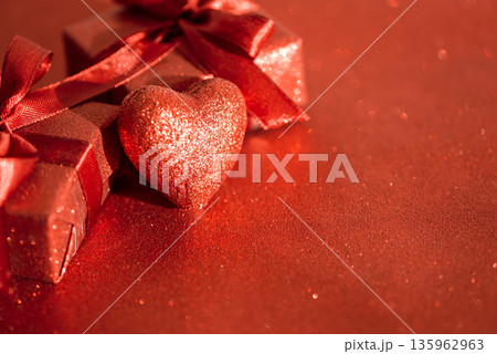 Glittery Red Gift Boxes with Satin Bows and Glittery Heart. Romantic Valentines Day Flatlay 135962963