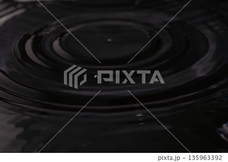 236.Concentric Ripples from Droplet on Dark Surface 236.Concentric Ripples from Droplet on Dark Surface 135963392