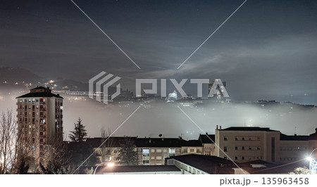 Night city and fog Night city and fog 135963458