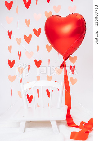 Minimal Valentines Day photo backdrop with heart decorations and white drapery. Romantic background for photoshoots, events and creative projects Minimal Valentines Day photo backdrop with heart decorations and white drapery. Romantic background for photoshoots, events and creative projects 135963763
