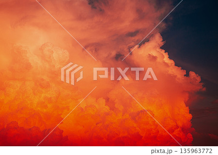 Dramatic twilight sky with vibrant orange sunset clouds 135963772