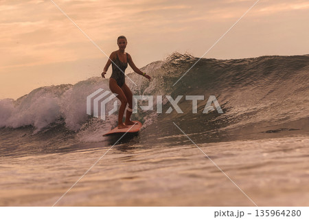 Wave Rider Supports Environmental Awareness During Evening Sunset 135964280