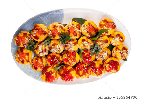 Top view of large baked sushi assortment with cheese sauce, red caviar and sesame 135964700