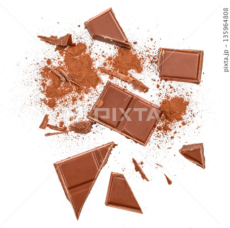 Broken milk chocolate pieces with cocoa powder isolated on white background 135964808
