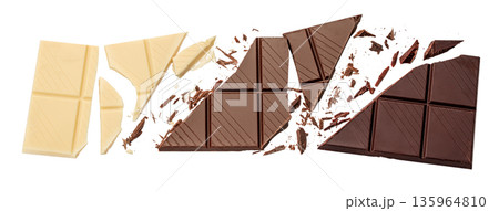 Broken white and dark chocolate bars isolated on white background 135964810