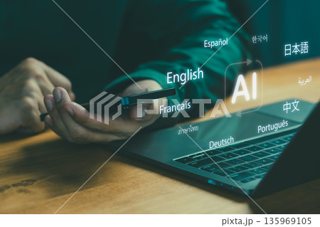 Person using smartphone and laptop with AI translation interface and multiple languages, symbolizing artificial intelligence, multilingual communication, and global technology connection. Person using smartphone and laptop with AI translation interface and multiple languages, symbolizing artificial intelligence, multilingual communication, and global technology connection. 135969105