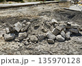 Pile of debris at road construction site 135970128