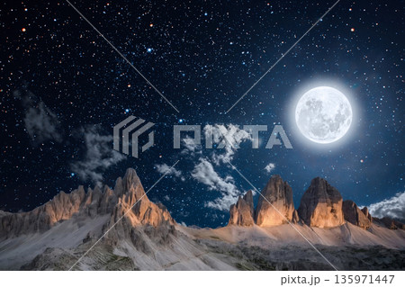 night landscape with stars and moon, milky way and galaxy in the mountains. beautiful nature background. 135971447