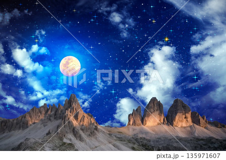 night landscape with stars and moon, milky way and galaxy in the mountains. beautiful nature background. 135971607