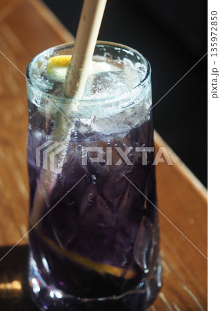 Refreshing drink served in a clear glass with ice Refreshing drink served in a clear glass with ice 135972850
