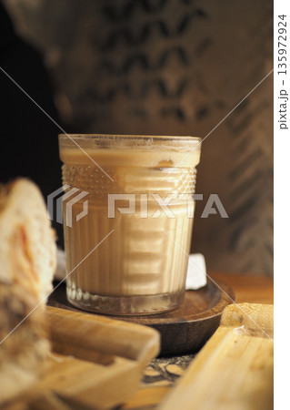 iced late on wooden table in coffee shop iced late on wooden table in coffee shop 135972924