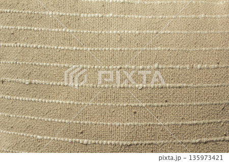Close up of beige fabric Close up of beige fabric 135973421