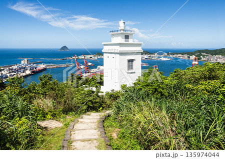 View of the Keelung Chiutzushan Lighthouse, which is the first Locally Built Lighthouse in Taiwan. With the Port of Keelung, Heping Island Park, and Keelung Islet. 135974044