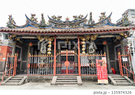 Building view of The Bangka Qingshui Temple in Wanhua of Taipei, Taiwan. It's a temple dedicated to Master Qingshui, also known as Zushi Gong, Black Faced Zushi. Building view of The Bangka Qingshui Temple in Wanhua of Taipei, Taiwan. It's a temple dedicated to Master Qingshui, also known as Zushi Gong, Black Faced Zushi. 135974326
