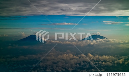 aerial view of a mountain landscape with a clear sky in the background aerial view of a mountain landscape with a clear sky in the background 135975683