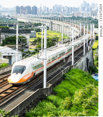 Overlooking view of the Taiwan High Speed Rail trains passing Changhua in Taiwan. It is the only high-speed railway in Taiwan. 135975804