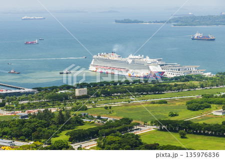 Overlooking view of the cruise ship docked at the Marina Bay Cruise Centre Singapore(MBCCS), a cruise terminal in Singapore located at Marina South. Overlooking view of the cruise ship docked at the Marina Bay Cruise Centre Singapore(MBCCS), a cruise terminal in Singapore located at Marina South. 135976836