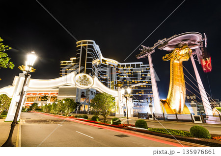 Beautiful night view of Wynn Palace, a hotel casino resort on the Cotai Strip in Macau, China. Beautiful night view of Wynn Palace, a hotel casino resort on the Cotai Strip in Macau, China. 135976861