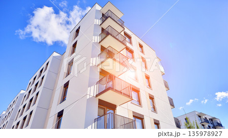 Luxury house complex of flats in condo area. Part of city real estate property, condo architecture on a sunny day no people. 135978927