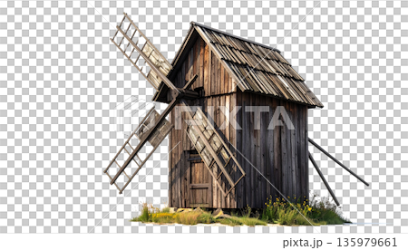 An old wooden windmill is abandoned on a grassy hill in the countryside against a white background. 135979661