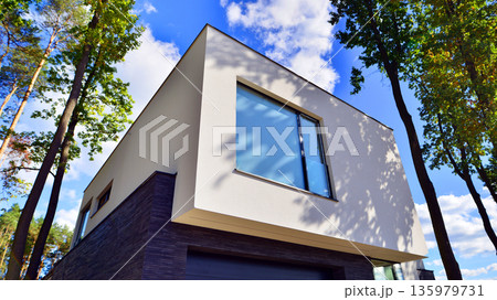 Single family house construction site. Modern designed single-family house under construction. 135979731