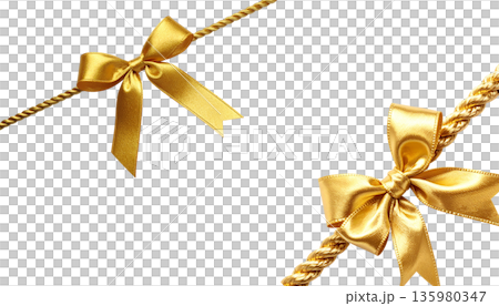 A shimmering gold ribbon is tied in a bow and placed against a white background. A shimmering gold ribbon is tied in a bow and placed against a white background. 135980347