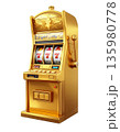A slot machine with three spinning reels and the number seven, separated on a white background. 135980778