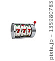 A slot machine with three spinning reels and the number seven, separated on a white background. 135980783