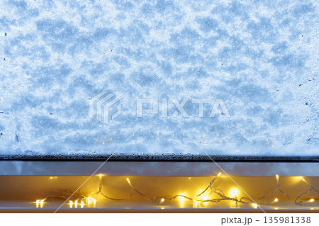 window glass is covered in snow window glass is covered in snow 135981338