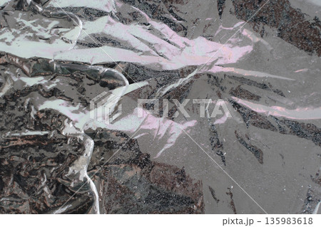 Iridescent wrinkled metallic foil reflecting light texture Iridescent wrinkled metallic foil reflecting light texture 135983618