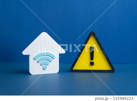 A house with a Wi-Fi symbol and a warning sign. No internet due to outage or nonpayment. Poor Wi-Fi signal. Digital dependence issue, connectivity failure and modern home disruption 135984223