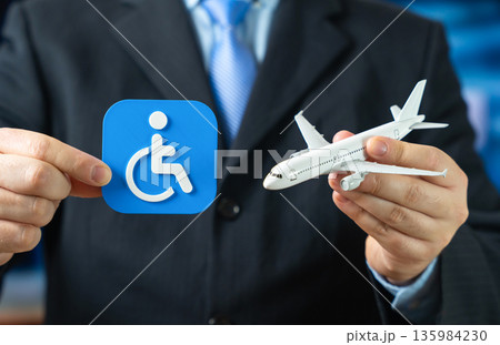 The symbol of a person with a disability and a passenger aircraft. Rules and requirements for transporting physically disabled passengers. Inclusive travel policy, accessibility standards The symbol of a person with a disability and a passenger aircraft. Rules and requirements for transporting physically disabled passengers. Inclusive travel policy, accessibility standards 135984230