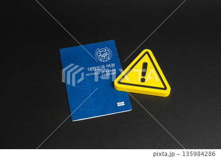 Republic of Korea passport and caution sign. Tightening of rules for obtaining a passport or South Korea citizenship. Changes in legislation and border crossing regulations. Temporary residence permit 135984286