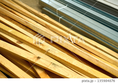 Wooden stacked timber beams for construction and repair Wooden stacked timber beams for construction and repair 135984876