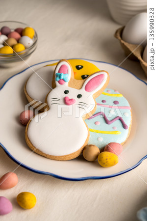Easter estive background. Colourful easter cookies bunny, egg, chick and carrot. Easter estive background. Colourful easter cookies bunny, egg, chick and carrot. 135990328