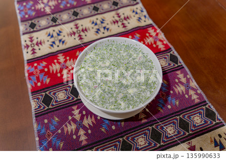 A dish on a plate. A dish on a plate. 135990633