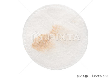 A cotton pad for cosmetic procedures. Isolated on a white background A cotton pad for cosmetic procedures. Isolated on a white background 135992488