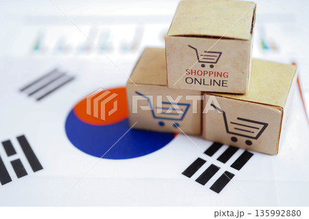 Online shopping, Shopping cart box on South Korea flag, import export, finance commerce. 135992880